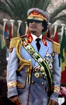 africa arab glasses libya meta:photo muammar_al_gaddafi north_africa portrait uniform // 550x875 // 111KB