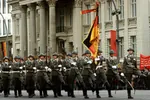 flag german_democratic_republic germany helmet meta:photo nationale_volksarmee parade soldier uniform // 900x600 // 101KB