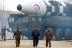 glasses kim_jong_un korea_dpr meta:photo missile nuclear // 779x518 // 63KB
