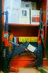 ansar_allah arabic_text book che_guevara friedrich_engels gun kalashnikov meta:photo rifle weapon yemen // 640x960 // 87KB