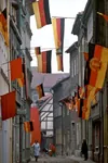 alleyway flag german_democratic_republic germany meta:photo red_flag // 467x704 // 135KB