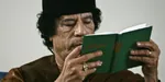 book green_book meta:photo muammar_al_gaddafi reading // 618x309 // 26KB