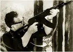 chile cold_war coup democratic_socialism glasses gun kalashnikov latin_america meta:monochrome meta:photo rifle salvador_allende weapon // 453x323 // 303KB