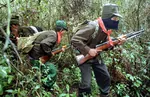 guerrilla gun jungle latin_america mask mexico weapon zapatista // 926x596 // 147KB